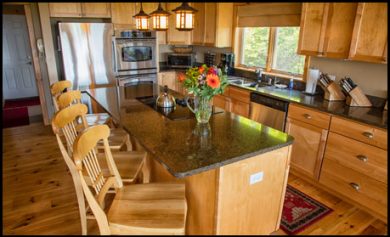 Everything you'd want in your kitchen back home is right here at The Bluff House. High-end appliances and finishes-plus a water view from your dining table!